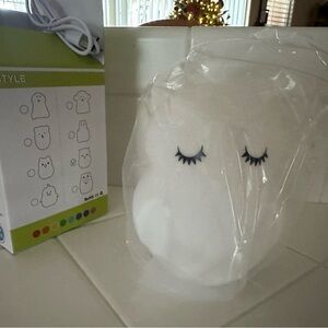 Cute White Night Light with Sleepy Eyes